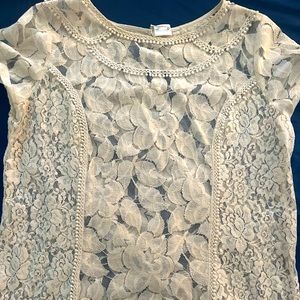 Gorgeous lace top with embellished accent
